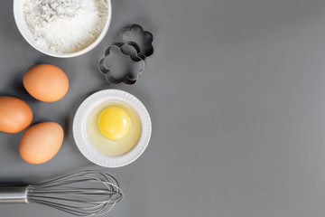 Eggs, flour, rolling pin, shape, corolla, baking ingredients with a copy of a stretch in a vintage style