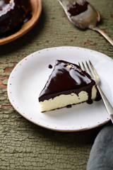 Piece of chocolate cheesecake on plate