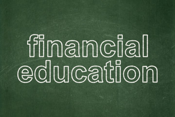 Obraz premium Education concept: Financial Education on chalkboard background