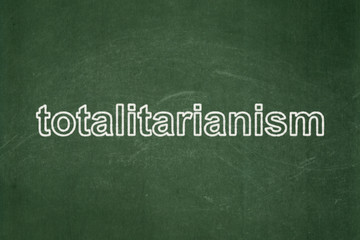 Fototapeta premium Politics concept: Totalitarianism on chalkboard background