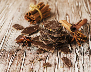 pieces of chocolate with cinnamon and anise stars