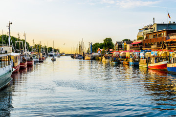 canal with ships and Baltic Sea in Warnemuende, Rostock Germany © eplisterra