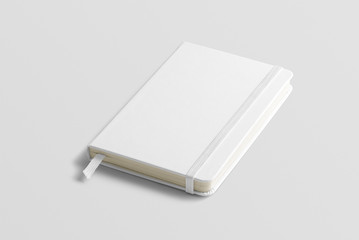Blank photorealistic notebook mockup on light grey background, front view. - obrazy, fototapety, plakaty