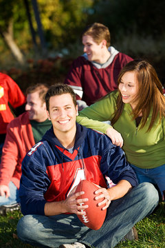 Football: Relaxing with Friends in Park