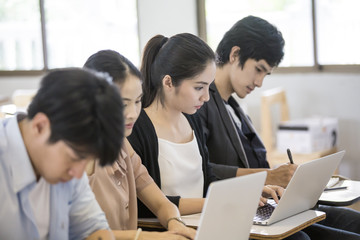Fototapeta premium Asian People study together in classroom. People with Education concept.