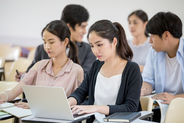 Fototapeta premium Asian People study together in classroom. People with Education concept.