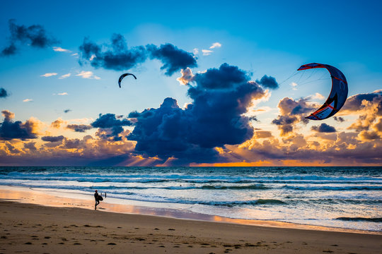 Kitesurfers at sunset, Hossegor, France