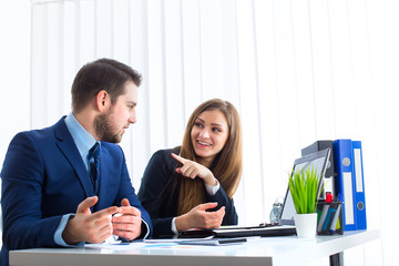 Businessman And Businesswoman Meeting In Modern Office