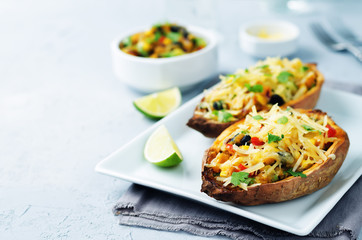 Black bean avocado corn stuffed sweet potatoes