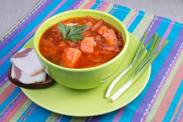 Traditional Russian and Ukrainian beetroot soup borscht in a bow