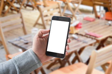 Mobile phone showcase. Closeup man hand. Smart phone with isolated screen for mockup.