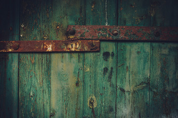 Wooden gates rusty metal texture