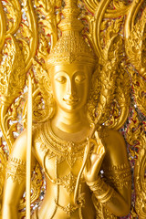 Thai golden statue with beautiful traditional texture.