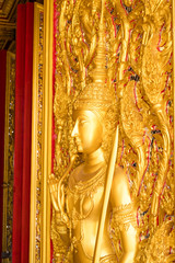 Thai golden statue with beautiful traditional texture.