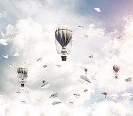 Flying hot air balloons in the air.