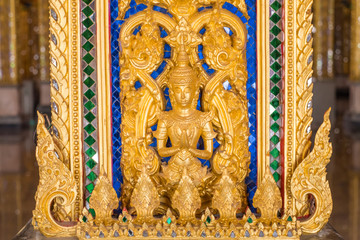 Thai golden statue with beautiful traditional texture.