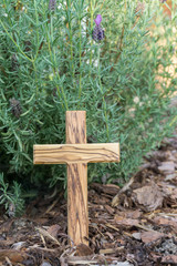 wooden cross against lavender