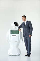 Humanoid autonomous robot with stylish man in a suit. Modern Robotic Technologies. Humanoid...