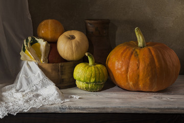 Harvest pumpkin on the table.