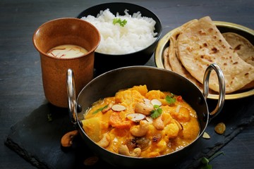 Vegetable or Navratan Korma - Indian Mixed Veg Curry served with Roti and rice