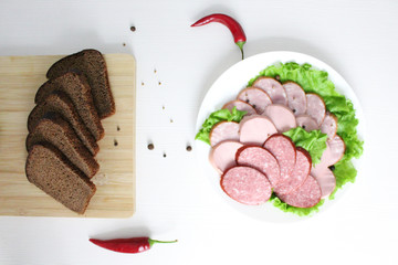 different kinds of sausage and bread