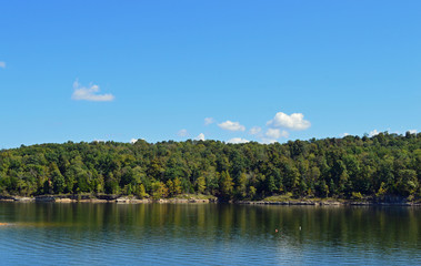 Fototapeta na wymiar Scenic landscape photo of a lake in the woods