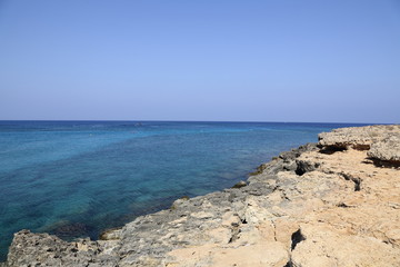 The coast with its rocky beach and clear water