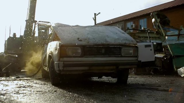 Cars for recycling. Drop frop cranes