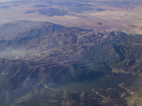 Aerial view of San Bernardino Mountains and Big Bear Lake, view from window seat in an airplane