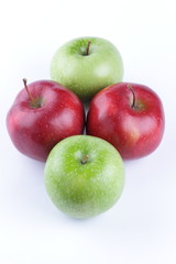 Red and green apples on a white background isolated for designer