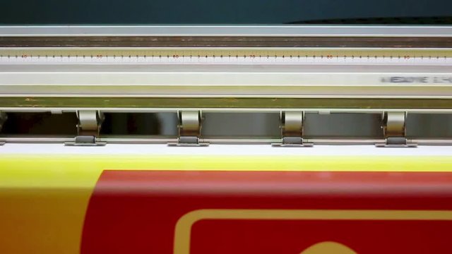 Wide format digital printing. Self adhesive film. Red color.