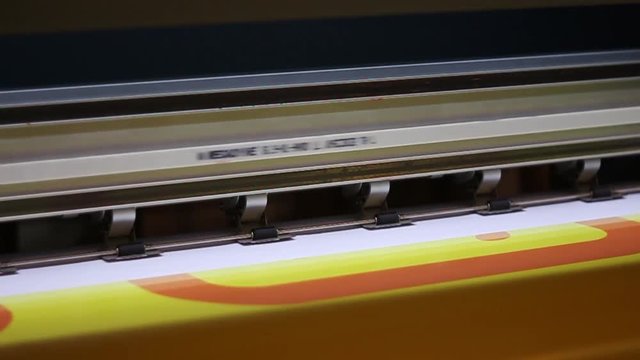 Wide format digital printing. Self adhesive film. Red color.