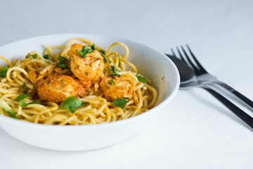 Spaghetti with chicken meat and cream sauce