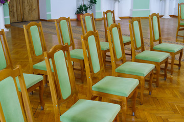 row of chairs with upholstery