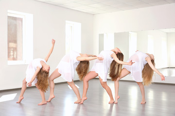 Group of young dancers in studio