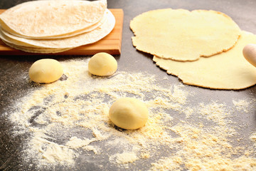 Dough for making tortillas on kitchen table