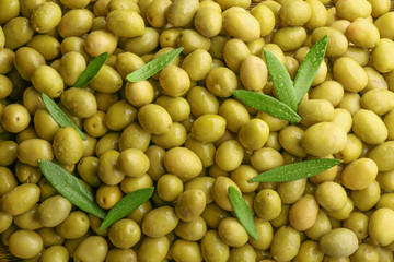 Many green olives as background