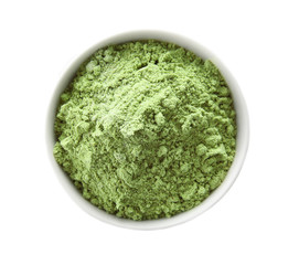 Bowl with wheat grass powder isolated on white