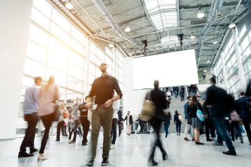 blurred visitors at a trade fair