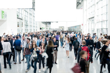 blurred visitors at a trade fair