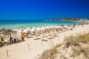 Fototapeta na wymiar Su Giudeu beach with white sand dunes, Chia, Sardinia, Italy