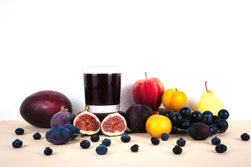 Grape juice with autumn seasonal fruits.