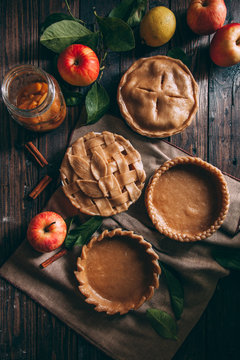 Preparing apple pies for baking