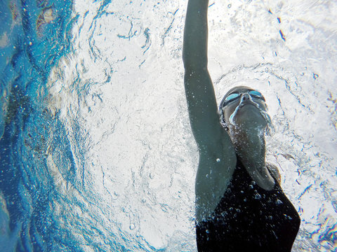 Underwater view of woman swimming