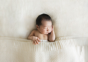New life - Asian newborn baby , sleeping in white blanket