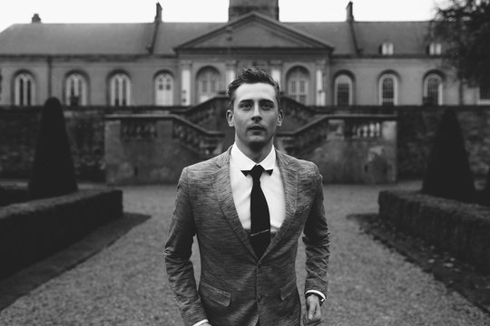 Elegant Young Man Portrait under the rain