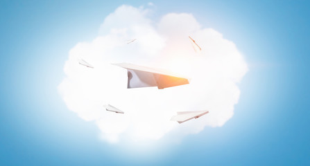 Fototapeta na wymiar Paper plane in blue sky