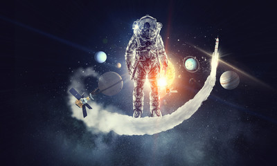 Astronaut surfing dark sky. Mixed media