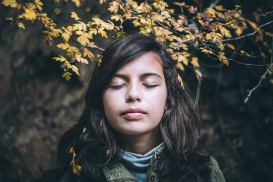 Portrait of a young girl in the woods