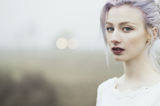 Portrait of young woman with dyed hair